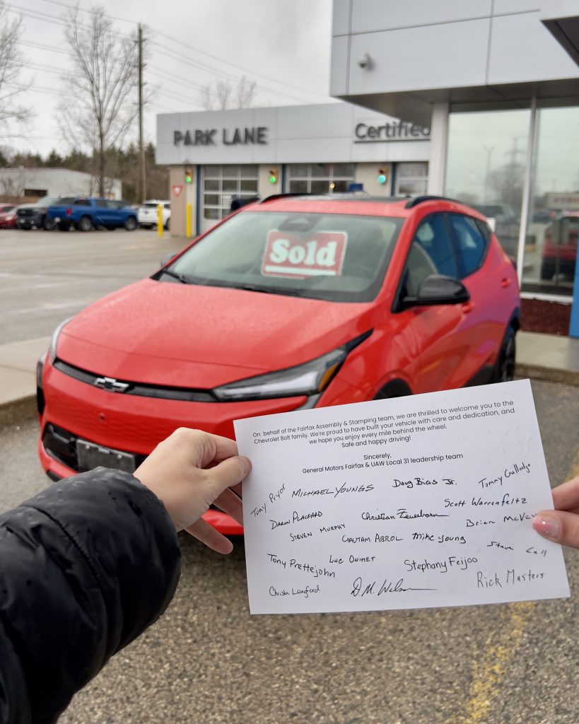 Tucked into the glove box of their new EV was a handwritten postcard signed by each and every person who built the vehicle from the Fairfax Assembly plant in Kansas, where their 2027 Chevrolet Bolt was built.